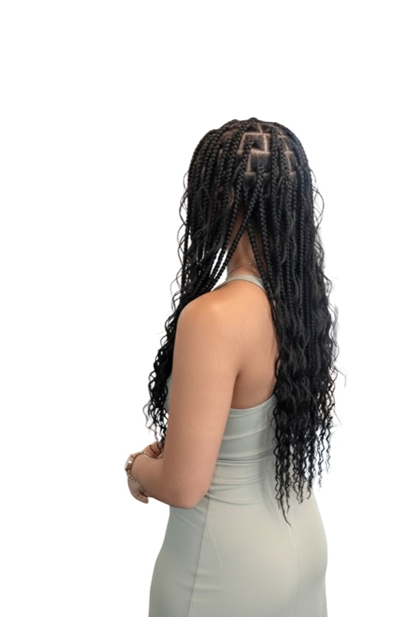 Box braids sectioned and installed at a Houston braiding salon