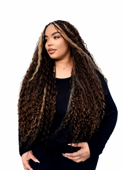 Boho braids with curly ends on a client in Houston